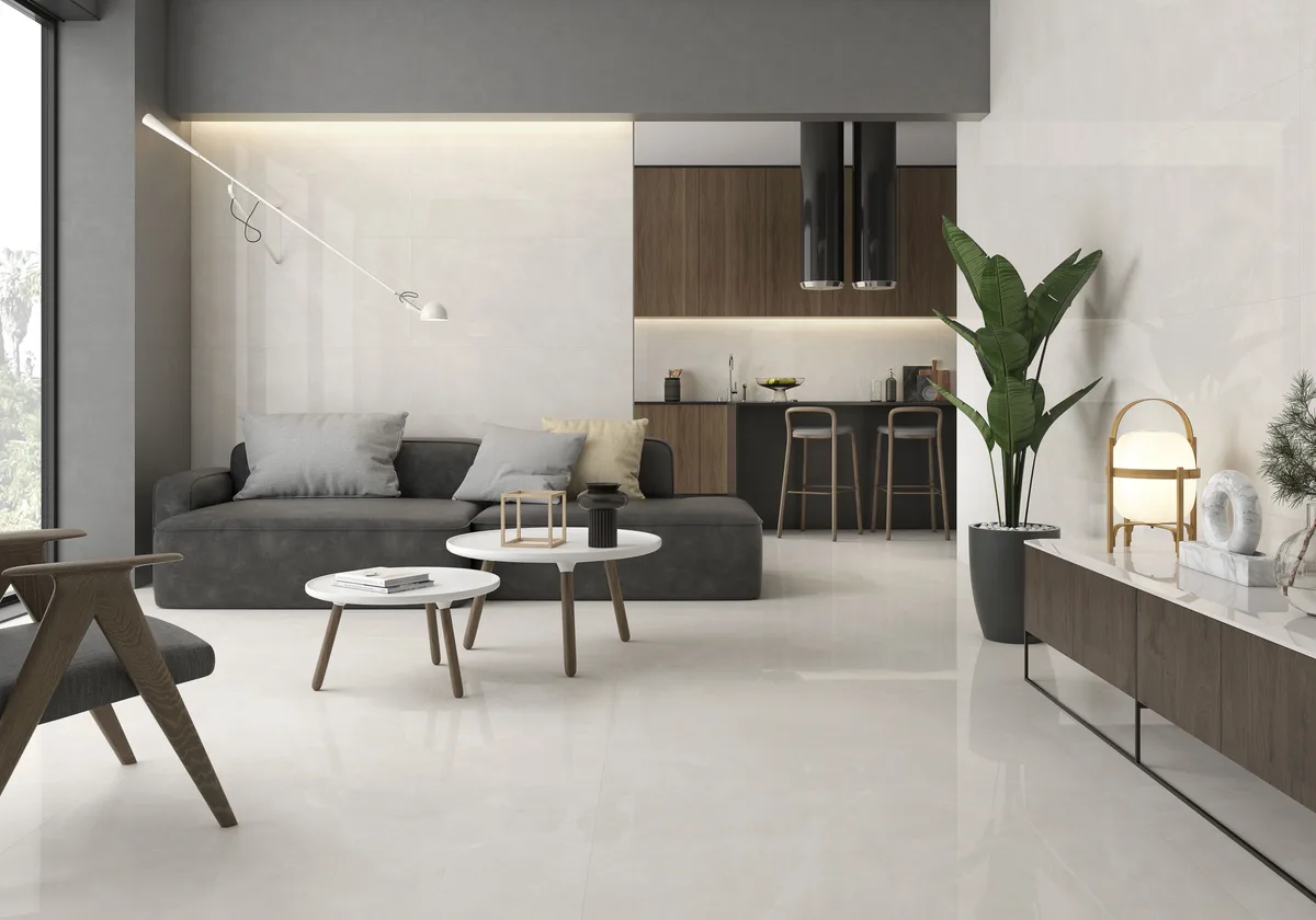 Soft sand-colored tile flooring in a bright living space